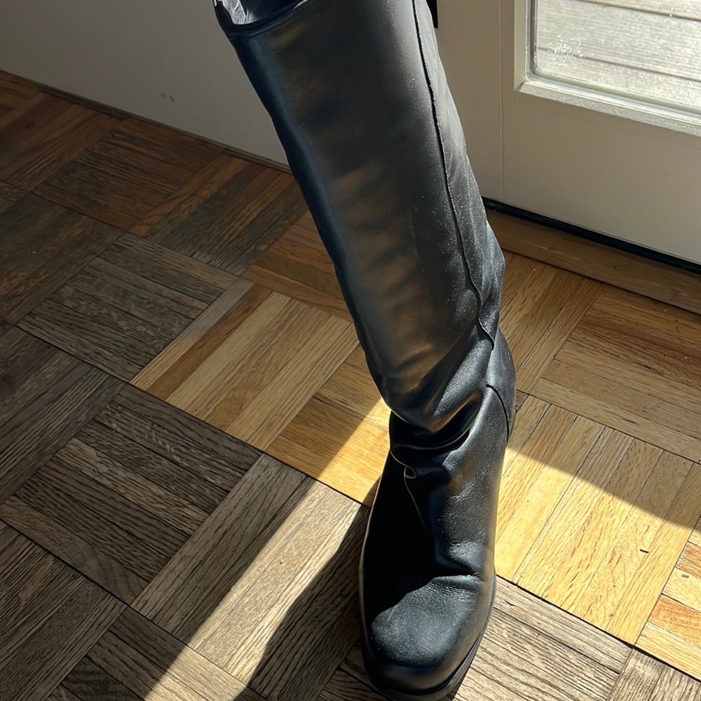 Santana Canada insulated knee high black boots. Like new